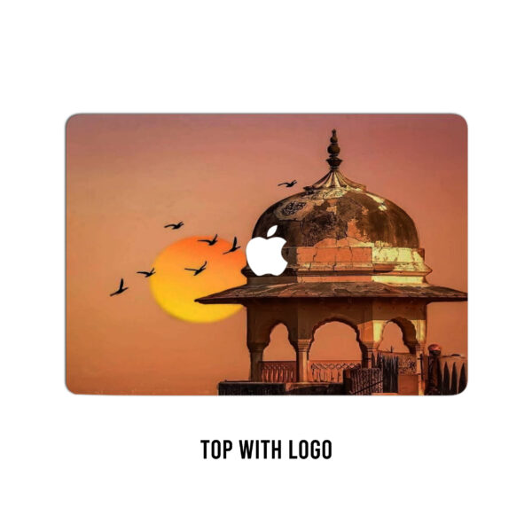 Dawn's embrace at Jaigarh! A symphony of sunlight and wings. Laptop skin edition